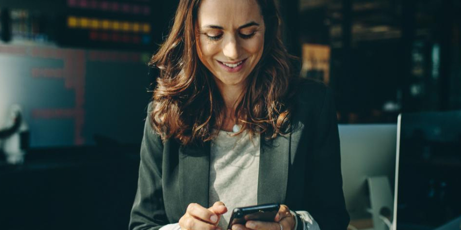 Business woman on mobile device