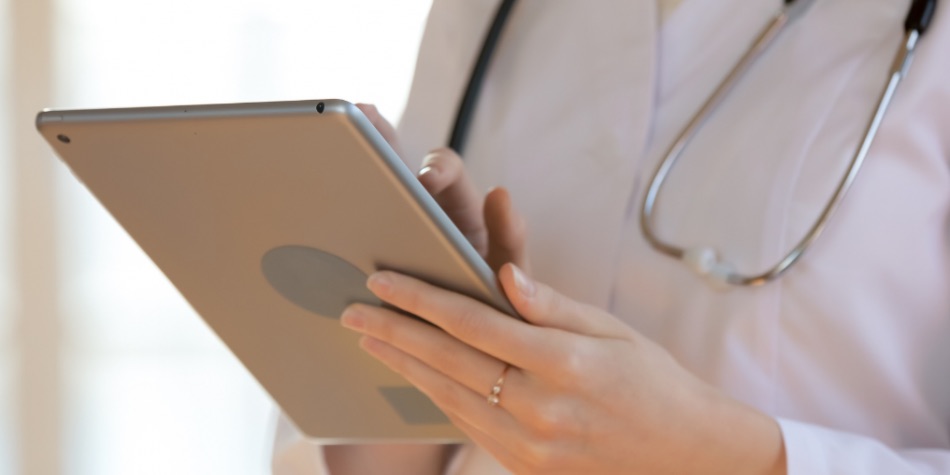 Doctor holding an tablet